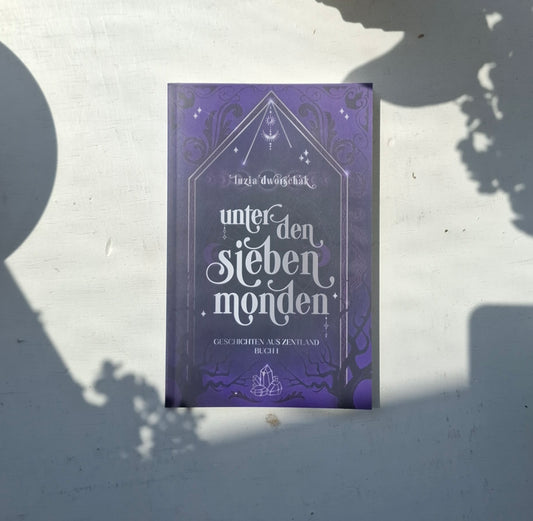 Taschenbuch "Unter den sieben Monden: Geschichten aus Zentland"